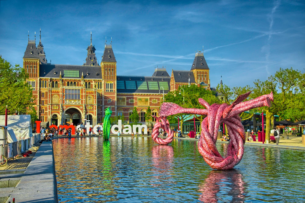 Sculptures in water near Rijksmuseum Amsterdam museum in Holland